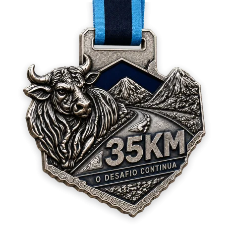 Medalha do Desafio 35KM, com a inscrição O Desafio Continua